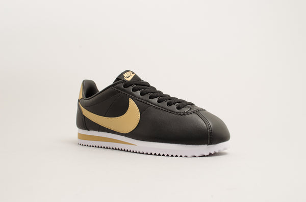 nike cortez black gold